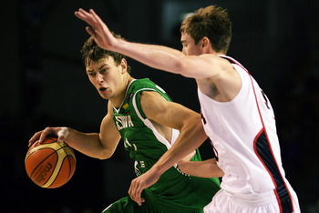 AUCKLAND, NEW ZEALAND - JULY 08:  Donatas Motiejunas of Lithuania tries to get past Gordon Hayward of the United States defends during the U19 Basketball World Championships match between the United States and Lithuania at North Shore Events Centre on Jul