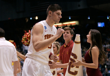 DAYTON, OH - MARCH 16: Nikola Vucevic #5 of the USC Trojans runs onto the court as he is introduced before the game against the Virginia Commonwealth Rams during the first round of the 2011 NCAA men's basketball tournament at UD Arena on March 16, 2011 in