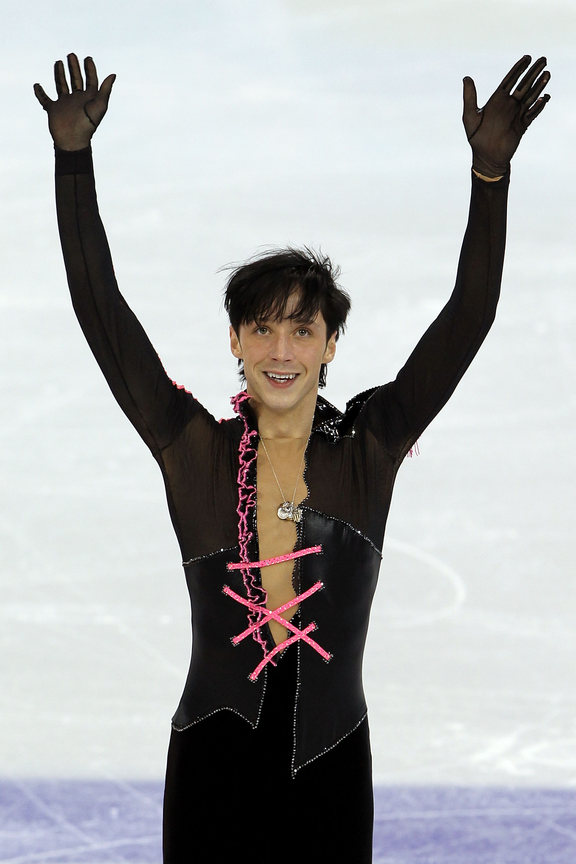 VANCOUVER, BC - FEBRUARY 16:  Johnny Weir of the United States reacts after his routine in the men's figure skating short program on day 5 of the Vancouver 2010 Winter Olympics at the Pacific Coliseum on February 16, 2010 in Vancouver, Canada.  (Photo by
