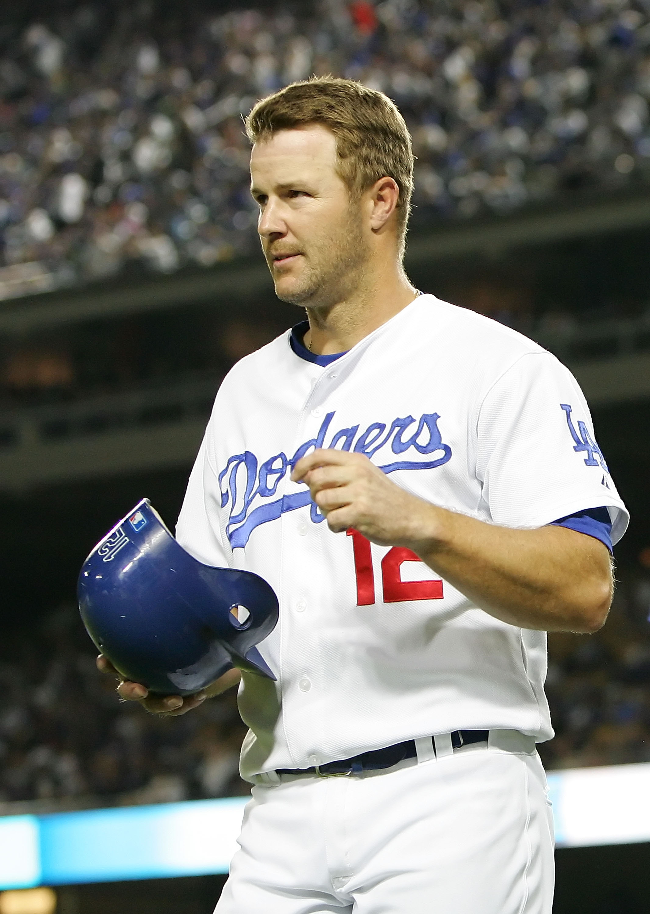 LOS ANGELES, CA - APRIL 25:  Jeff Kent #12 of the Los Angeles Dodgers returns to the dugout after scoring in the second inning against the Colorado Rockies at Dodger Stadium on April 25, 2008 in Los Angeles, California.  (Photo by Lisa Blumenfeld/Getty Im