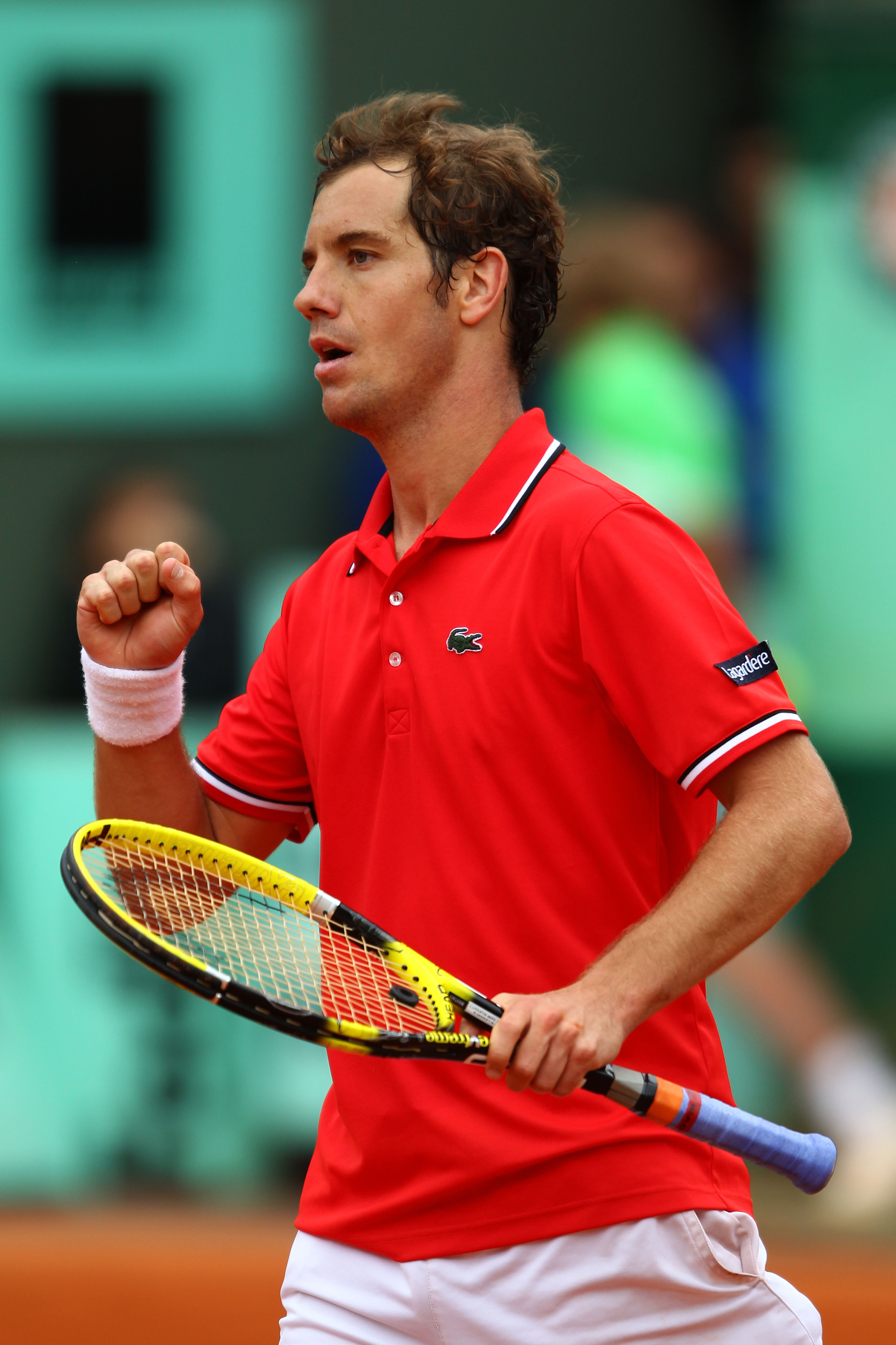 PARIS, FRANCE - MAY 27:  Richard Gasquet of France celebrates a point during the men's singles round three match between Richard Gasquet of France and Thomaz Bellucci of Brazil on day six of the French Open at Roland Garros on May 27, 2011 in Paris, Franc