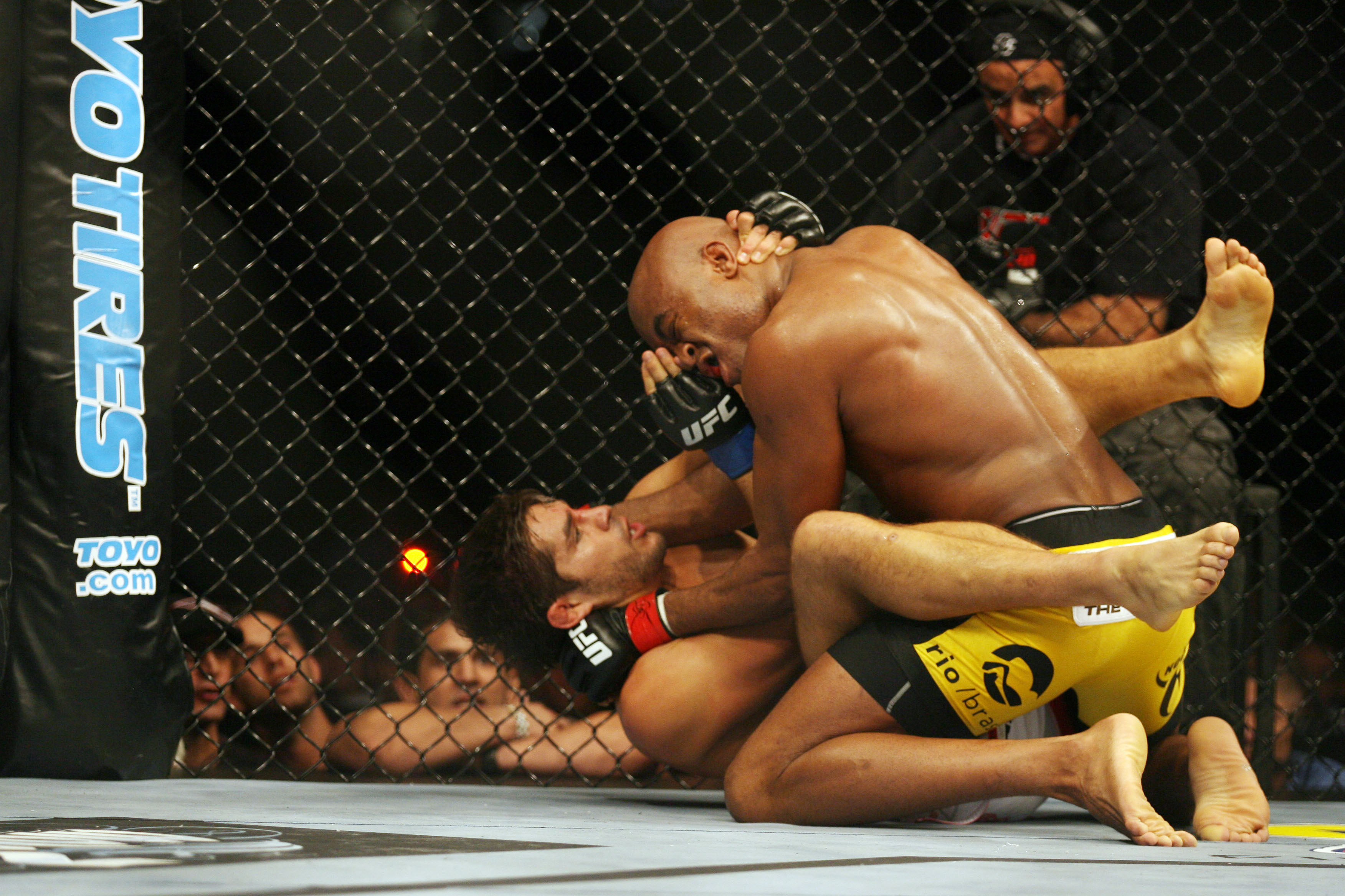 CHICAGO- OCTOBER 25:  Anderson Silva (R) fights Patrick Cote in the Middleweight Title Bout at UFC's Ultimate Fight Night at Allstate Arena on October 25, 2008 in Chicago, Illinois. (Photo by Tasos Katopodis/Getty Images)