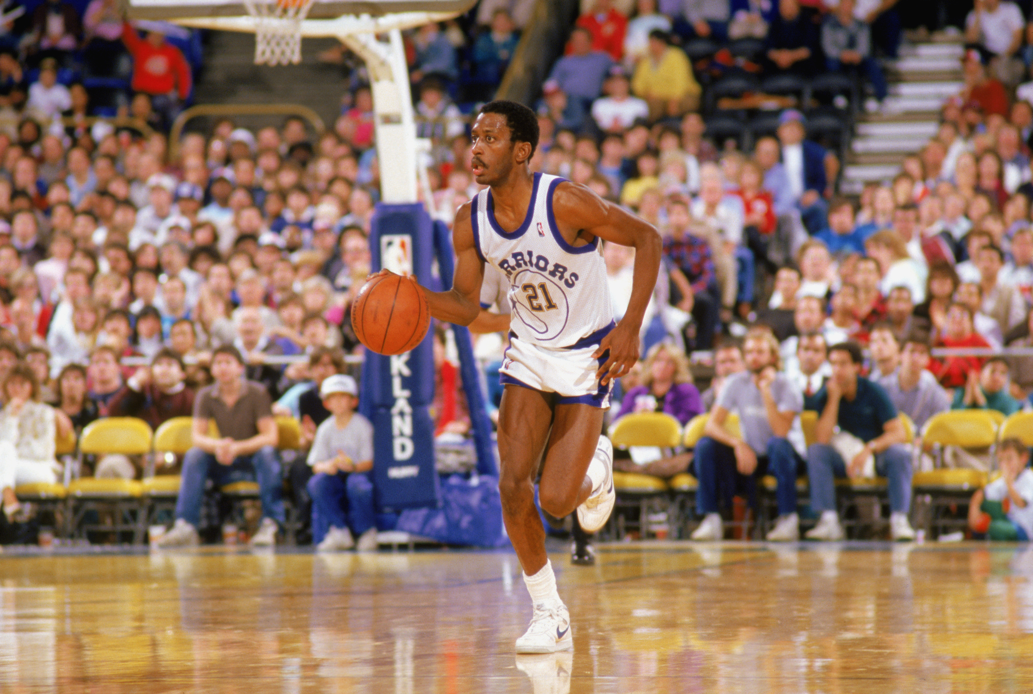 1988:  Eric Sleepy Floyd #21 of the Golden State Warriors drives upcourt during an NBA game in the 1988-89 season. NOTE TO USER: User expressly acknowledges and agrees that, by downloading and/or using this Photograph, User is consenting to the terms and