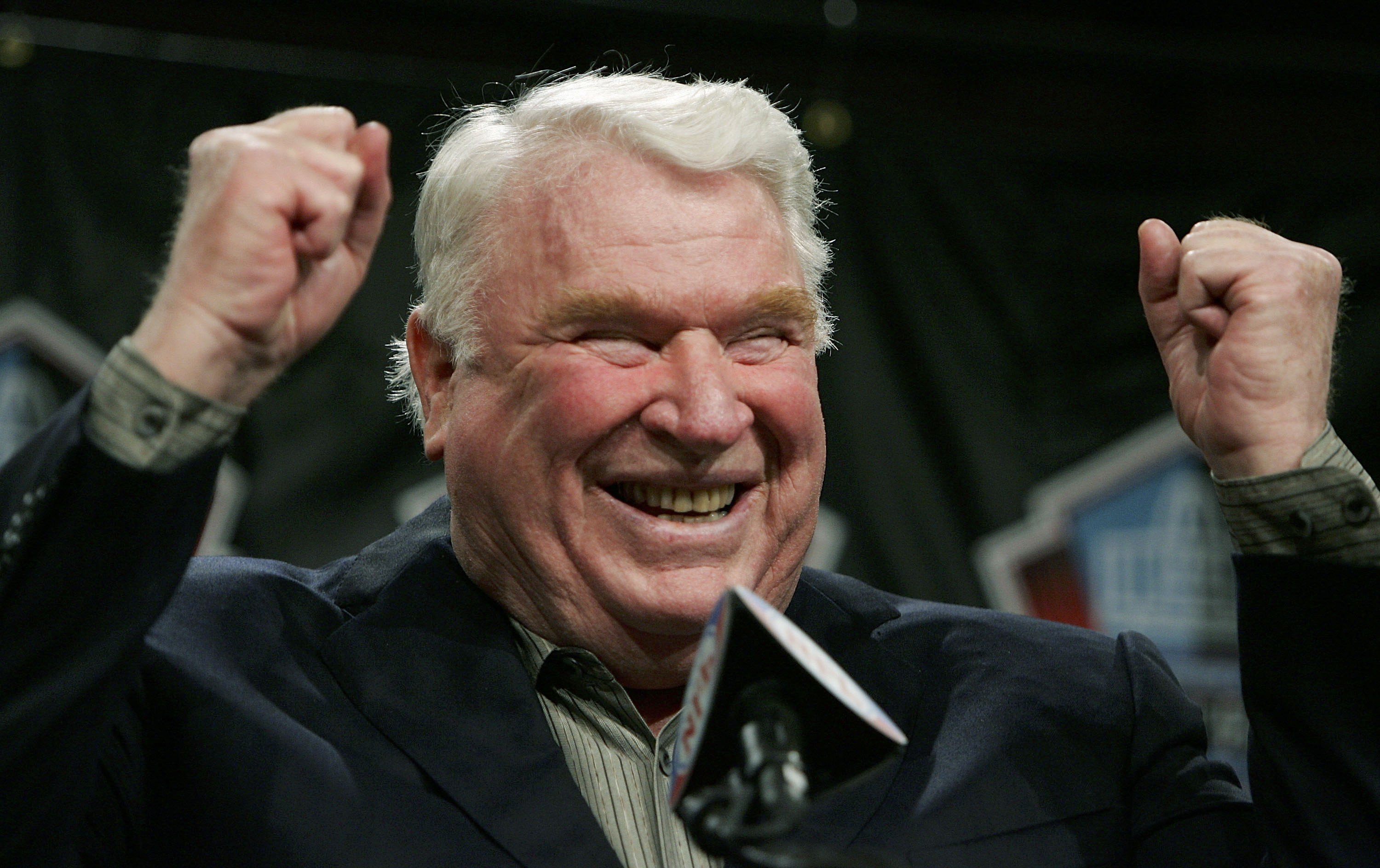 DETROIT - FEBRUARY 4:  Broadcaster and former coach John Madden celebrates his selection to the NFL Hall of Fame during a press conference February 4, 2006 at the Renaissance Center in Detroit, Michigan.  (Photo by Jonathan Daniel/Getty Images)