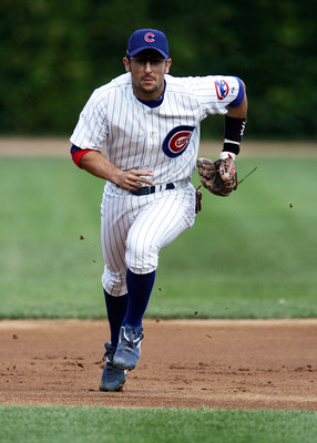 CHICAGO - AUGUST 27:  Nomar Garciaparra #5 of the Chicago Cubs charges toward home plate from his third base position against the Florida Marlins on August 27, 2005 at Wrigley Field in Chicago, Illinois. The Marlins defeated the Cubs 2-1.  (Photo by Jonat
