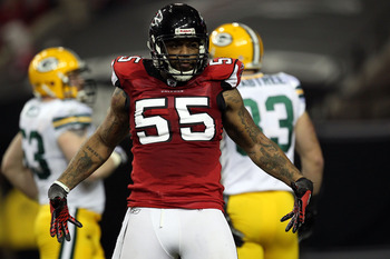 ATLANTA, GA - JANUARY 15:  John Abraham #55 of the Atlanta Falcons reacts after he recorded a sack against the Green Bay Packers during their 2011 NFC divisional playoff game at Georgia Dome on January 15, 2011 in Atlanta, Georgia.  (Photo by Streeter Lec
