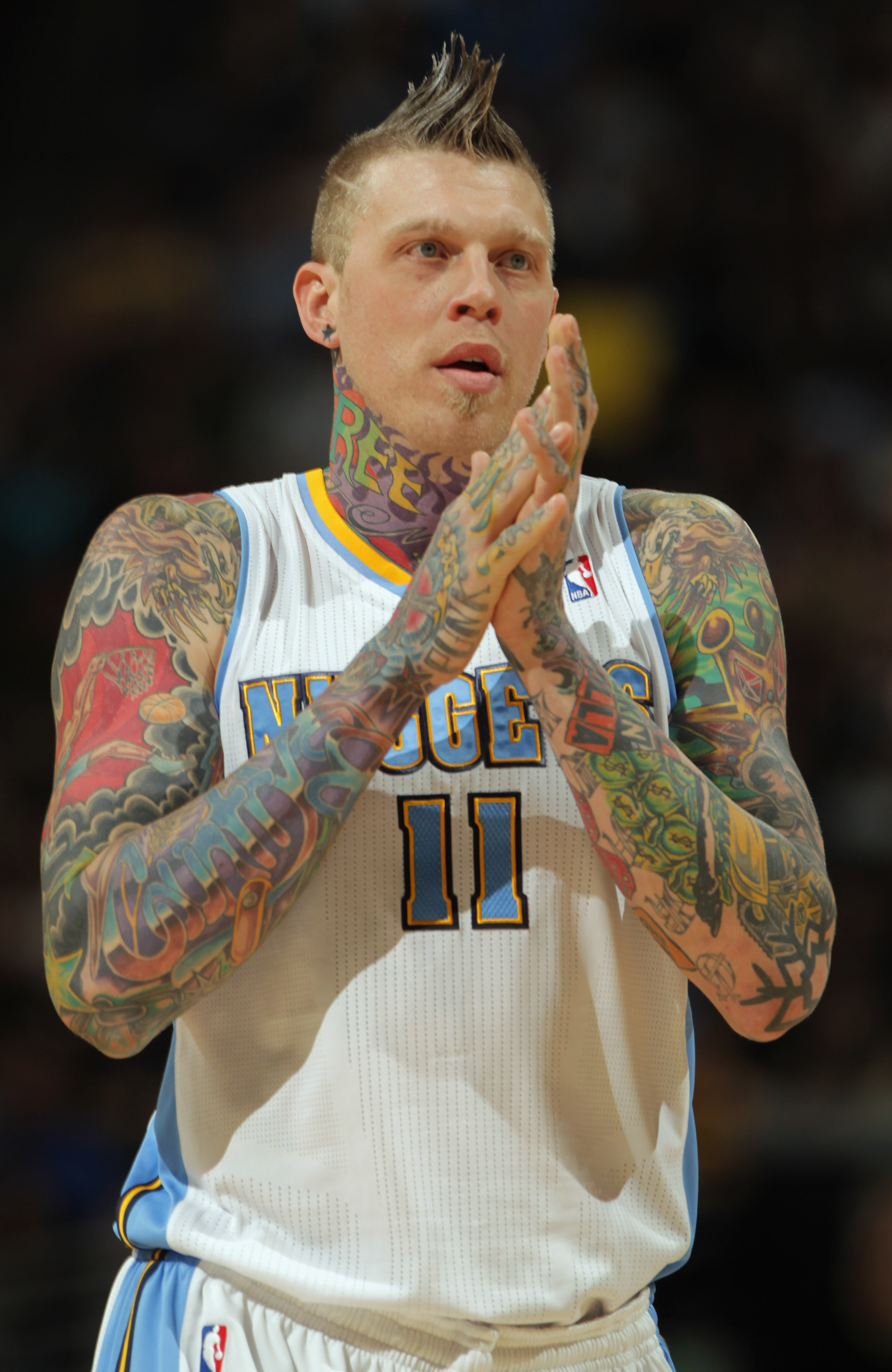 DENVER, CO - MARCH 23:  Chris Andersen #11 of the Denver Nuggets looks on against the San Antonio Spurs at the Pepsi Center on March 23, 2011 in Denver, Colorado. The Nuggets defeated the Spurs 115-112. NOTE TO USER: User expressly acknowledges and agrees