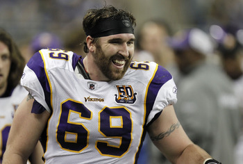 DETROIT, MI - JANUARY 02:  Jared Allen #69 of the Minnesota Vikings smiles on the bench after returning an interception for a touchdown while playing the Detroit Lions at Ford Field on January 2, 2011 in Detroit, Michigan. Detroit won the game 20-13.  (Ph