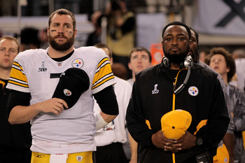 ARLINGTON, TX - FEBRUARY 06:  Ben Roethlisberger #7 and head coach Mike Tomlin of the Pittsburgh Steelers look on during the National Anthem during Super Bowl XLV at Cowboys Stadium on February 6, 2011 in Arlington, Texas.  (Photo by Jamie Squire/Getty Im
