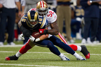 ST. LOUIS, MO - DECEMBER 26: Patrick Willis #52 of the San Francisco 49ers tackles Danny Amendola #16 of the St. Louis Rams at the Edward Jones Dome on December 26, 2010 in St. Louis, Missouri. The Rams beat the 49ers 25-17. (Photo by Dilip Vishwanat/Gett