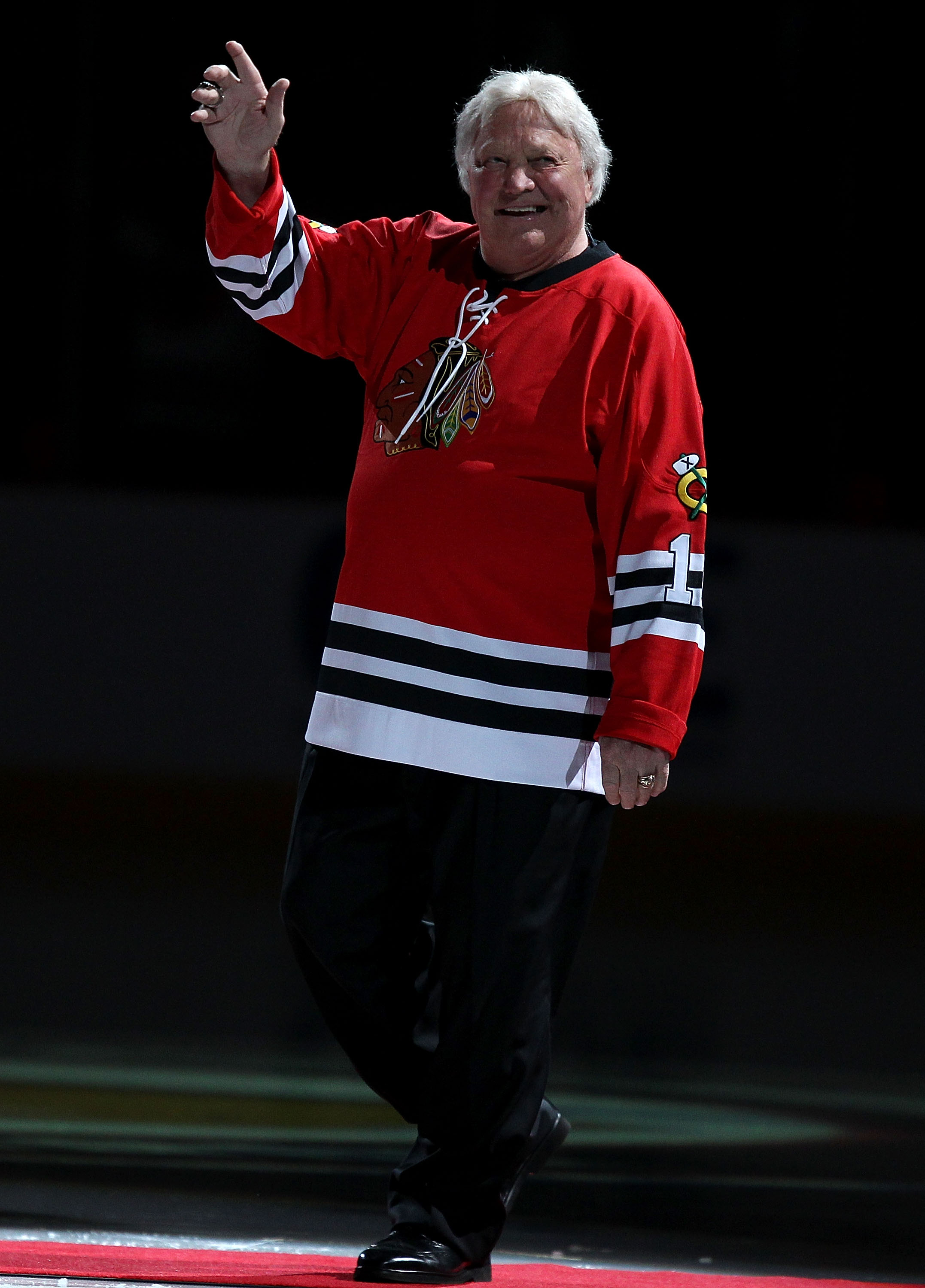 CHICAGO, IL - JANUARY 09: Former player Bobby Hull of the Chicago Blackhawks is introduced to the crowd during a Heritage Night to honor the 1961 Stanley Cup Championship team before a game against the New York Islanders at the United Center on January 9,
