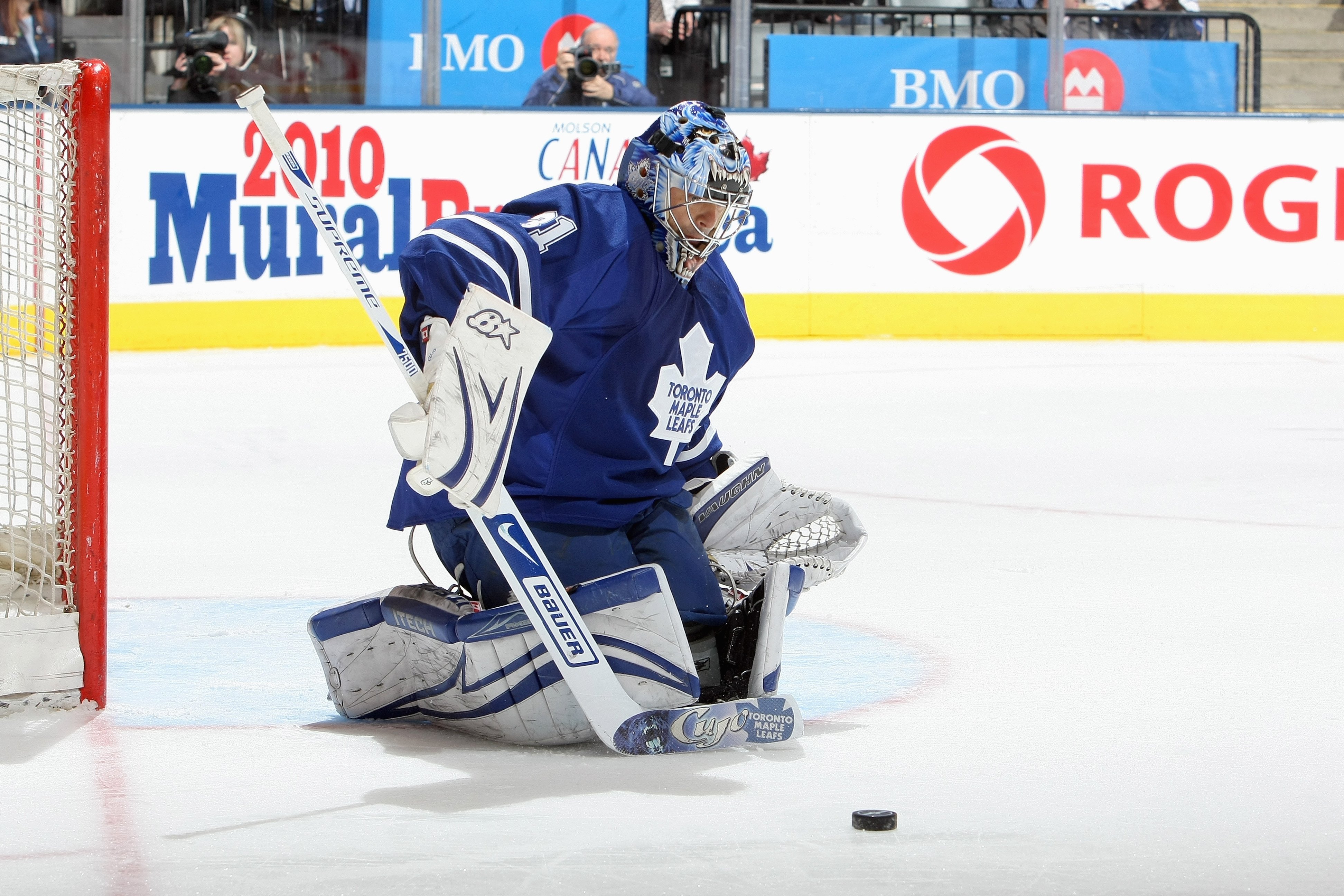 TORONTO - APRIL 8: Goalie Curtis Joseph #31 of the Toronto Maple Leafs stops the puck against the Buffalo Sabres during their NHL game at the Air Canada Centre on April 8, 2009 in Toronto, Ontario. (Photo by: Dave Sandford/Getty Images)