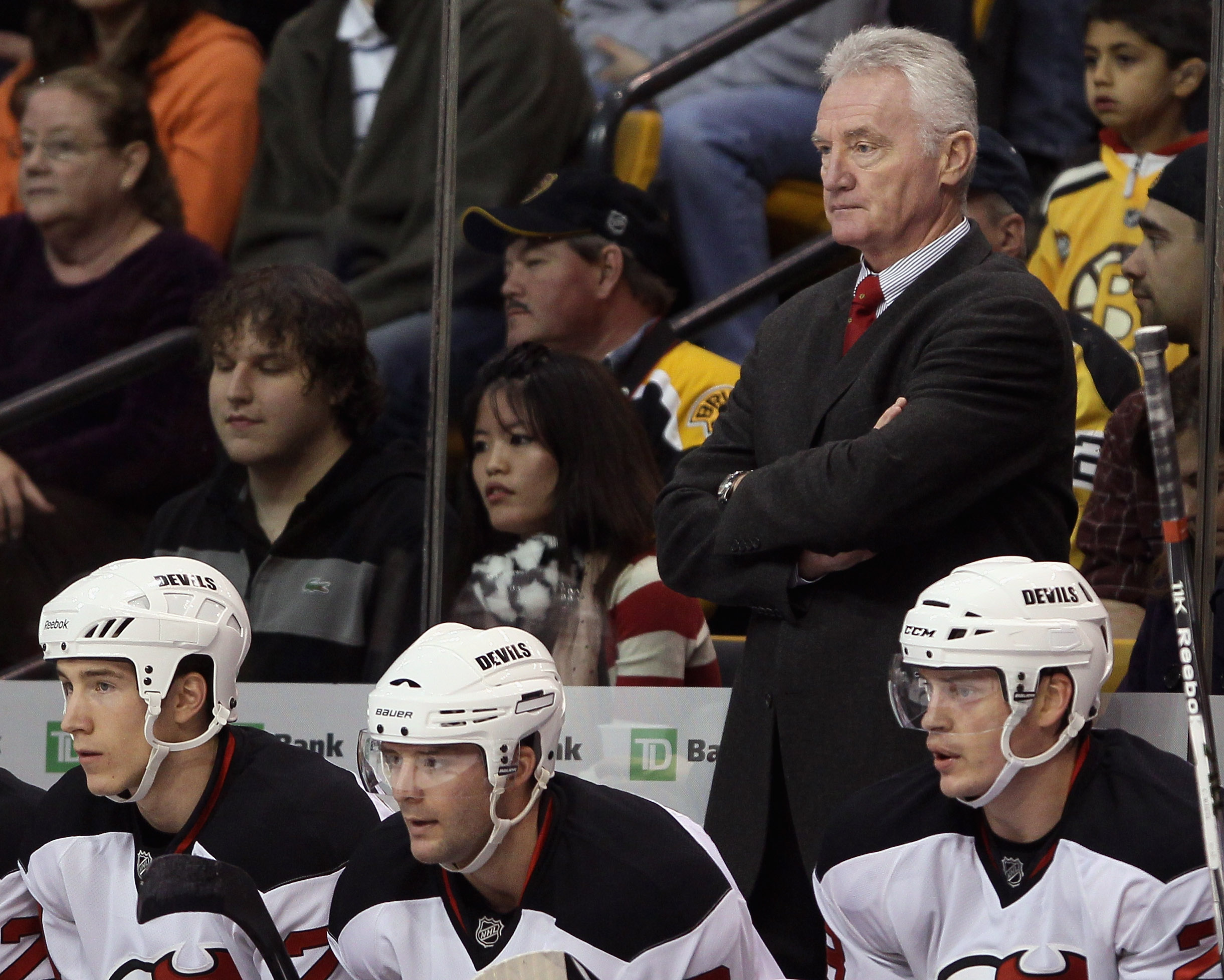 BOSTON - NOVEMBER 15:  Assistant coach Larry Robinson of the New Jersey Devils looks on from the bench in the first period against the Boston Bruins on November 15, 2010 at the TD Garden in Boston, Massachusetts.  (Photo by Elsa/Getty Images)