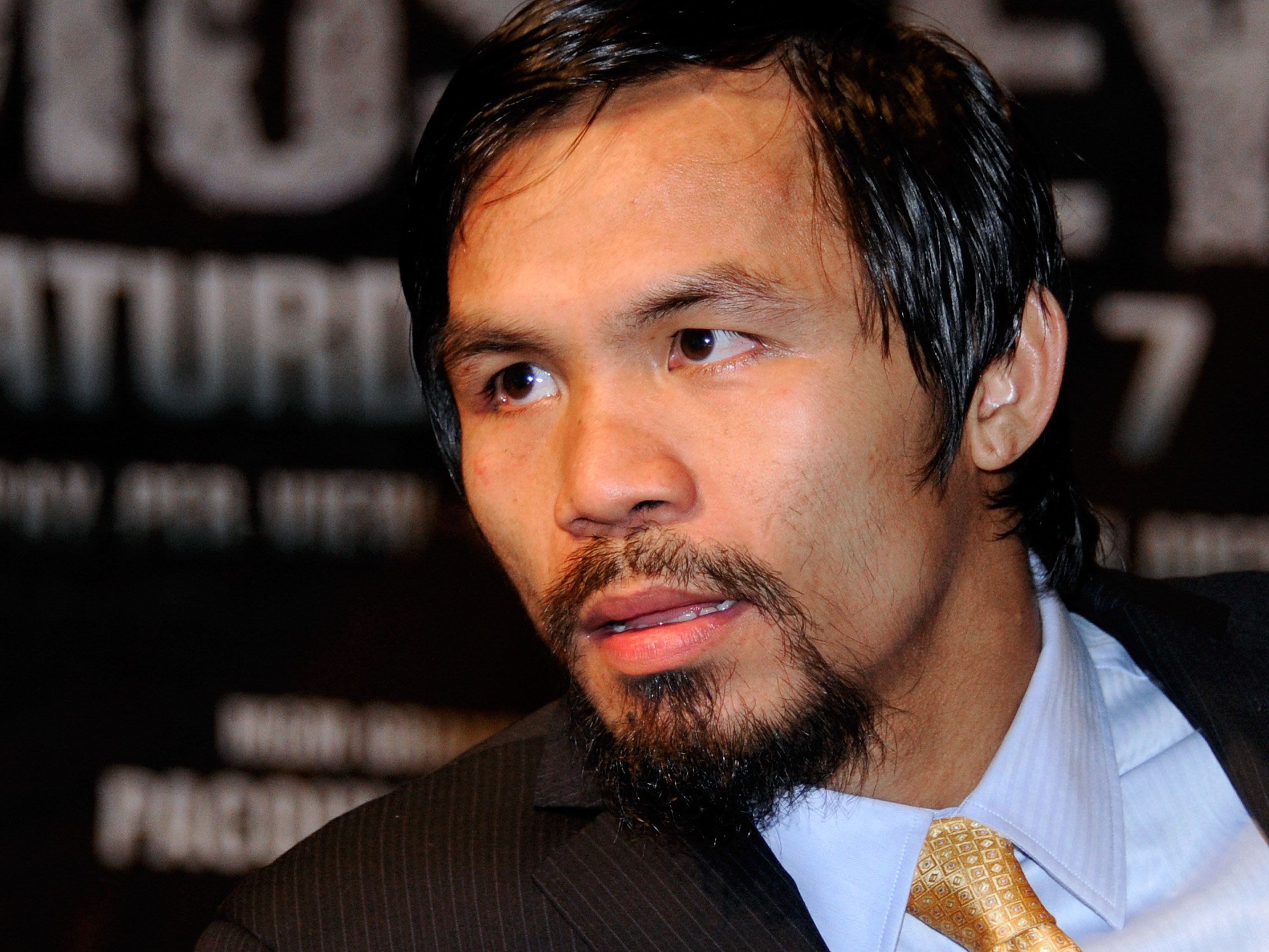 LAS VEGAS, NV - MAY 07: Boxer Manny Pacquiao listens to a question at a post-fight news conference after he defeated Shane Mosley by unanimous decision to retain his WBO welterweight title at the MGM Grand Garden Arena May 7, 2011 in Las Vegas, Nevada.