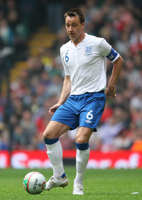 CARDIFF, WALES - MARCH 26:  John Terry of England in action during the UEFA EURO 2012 Group G qualifying match between Wales and England at the Millennium Stadium on March 26, 2011 in Cardiff, Wales.  (Photo by Alex Livesey/Getty Images)