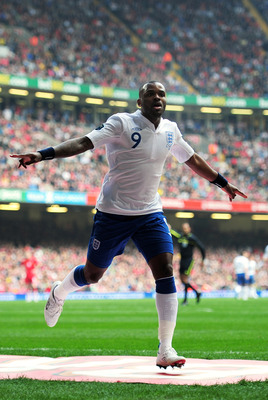 CARDIFF, WALES - MARCH 26:  Darren Bent of England celebrates after scoring his team's second goal during the UEFA EURO 2012 Group G qualifying match between Wales and England at the Millennium Stadium on March 26, 2011 in Cardiff, Wales.  (Photo by Shaun