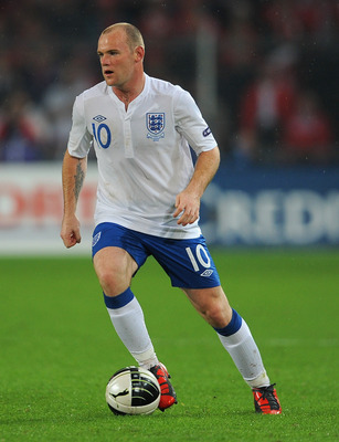 BASEL, SWITZERLAND - SEPTEMBER 07:  Wayne Rooney of England in action during the EURO 2012 Group G Qualifier between Switzerland and England at St Jakob Park on September 7, 2010 in Basel, Switzerland.  (Photo by Michael Regan/Getty Images)