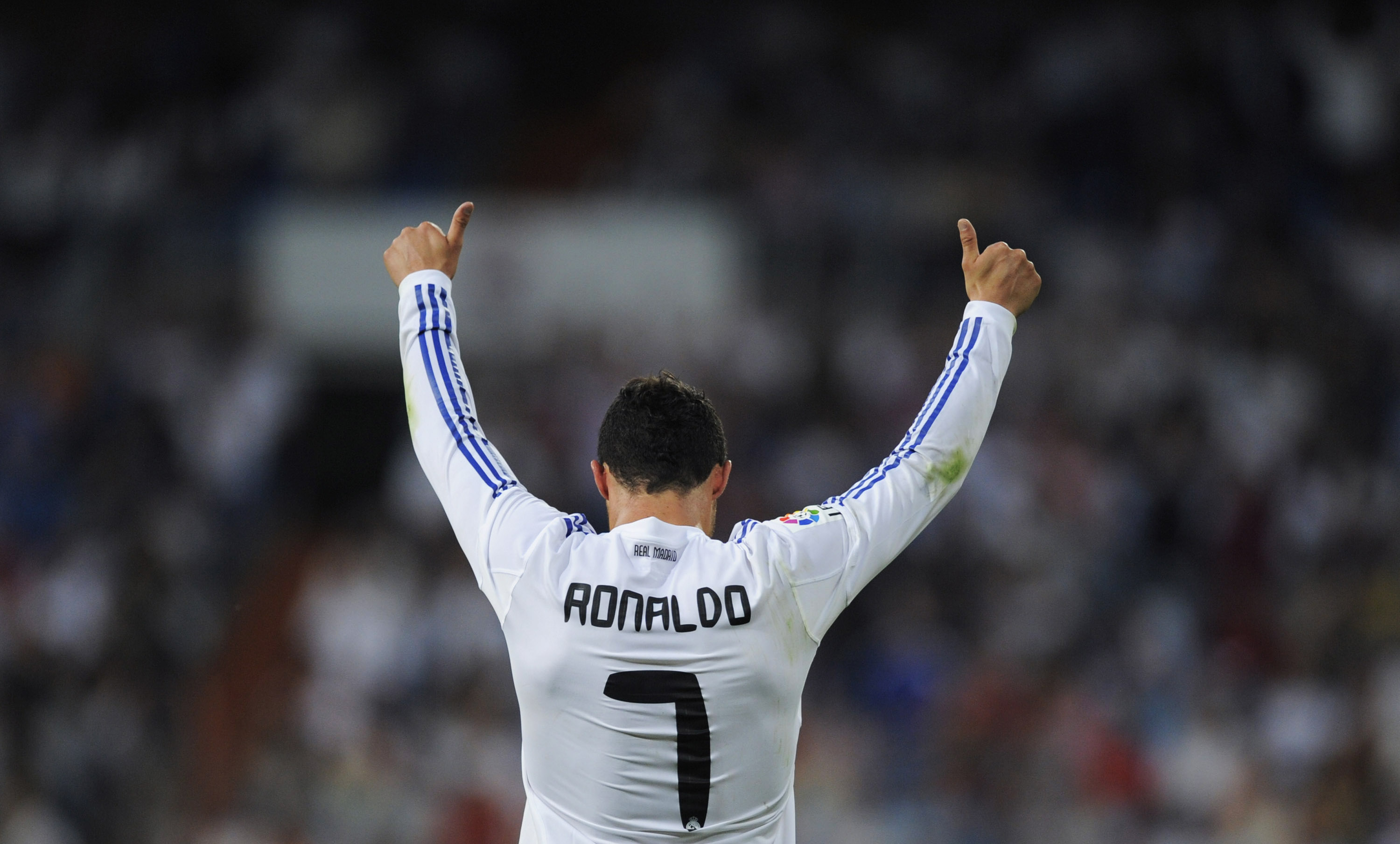 MADRID, SPAIN - MAY 21:  Cristiano Ronaldo of Real Madrid celebrates after scoring his 2nd goal during the La Liga match between Real Madrid and UD Almeria at Estadio Santiago Bernabeu on May 21, 2011 in Madrid, Spain.  (Photo by Denis Doyle/Getty Images)