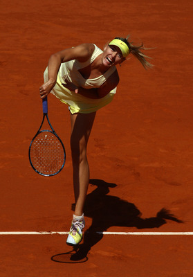 PARIS, FRANCE - JUNE 02:  Maria Sharapova of Russia serves during the women's singles semi final match between Na Li of China and Maria Sharapova of Russia on day twelve of the French Open at Roland Garros on June 2, 2011 in Paris, France.  (Photo by Alex