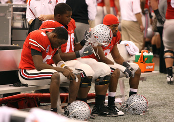 NEW ORLEANS - JANUARY 07: Members of the Ohio State Buckeyes sit dejected after losing 38-24 to the Louisiana State University Tigers during the AllState BCS National Championship on January 7, 2008 at the Louisiana Superdome in New Orleans, Louisiana.