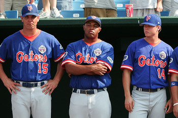 OMAHA, NE - JUNE 26:  Members of the Florida Gators look on from the dugout after losing to the Texas Longhorns during Game 2 of the championship series of the 59th College World Series on June 26, 2005 at Rosenblatt Stadium in Omaha, Nebraska.  (Photo by