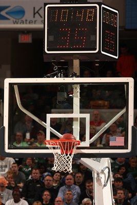 INDIANAPOLIS - MARCH 14:  A detail of the backboard and shot clock as a basketball goes thru the hoop as the Michigan State Spartans play against the Ohio State Buckeyes during their semifinal game of the Big Ten Men's Basketball Tournament at Conseco Fie