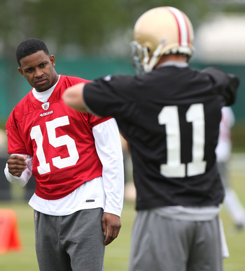 San Francisco 49ers wide receiver Michael Crabtree (R) fails to