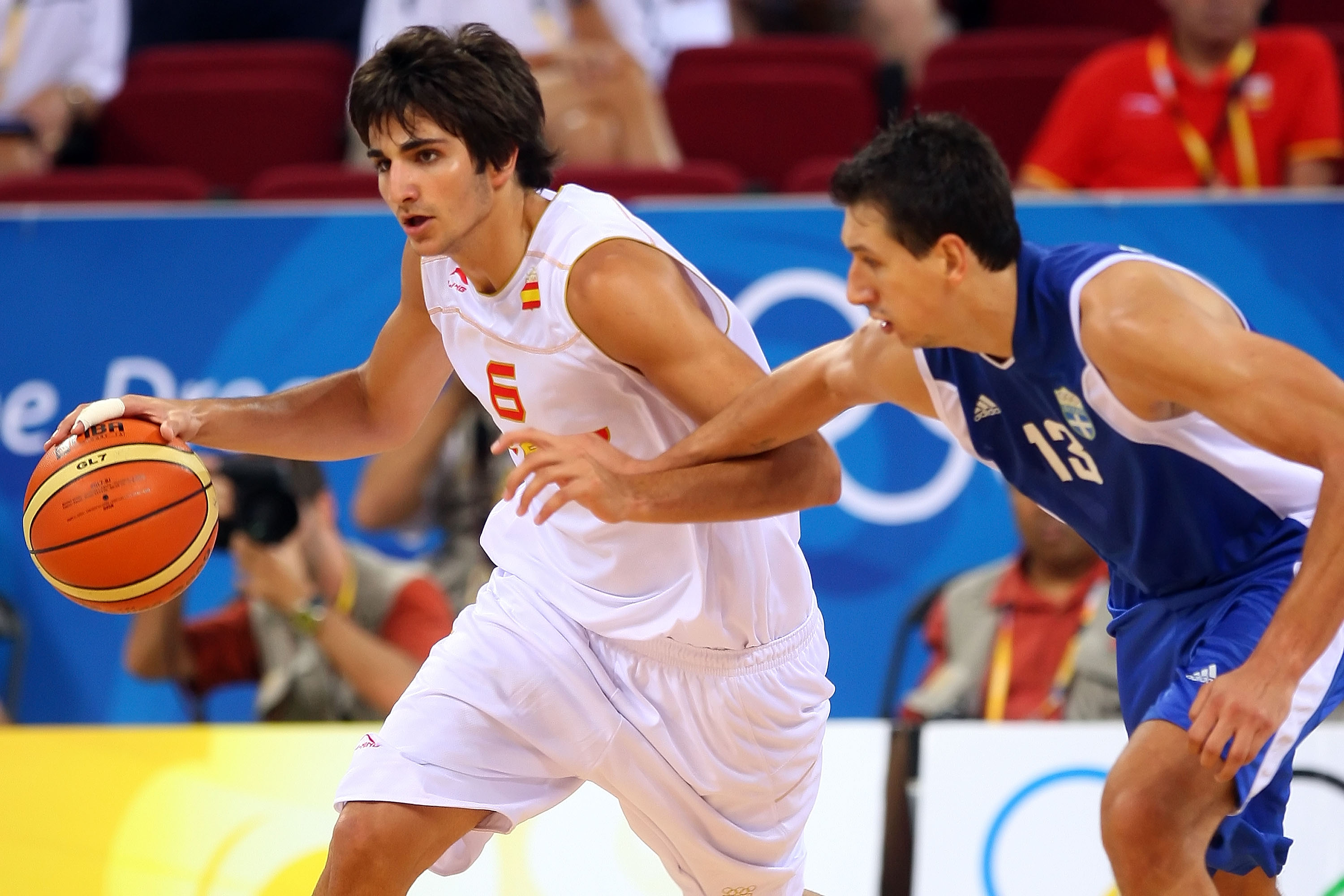 BEIJING - AUGUST 10:  Ricky Rubio #6 of Spain drives on Dimitrios Diamantidis #13 of Greece during the day 2 preliminary game at the Beijing 2008 Olympic Games in the Beijing Olympic Basketball Gymnasium on August 10, 2008 in Beijing, China.  (Photo by Ph