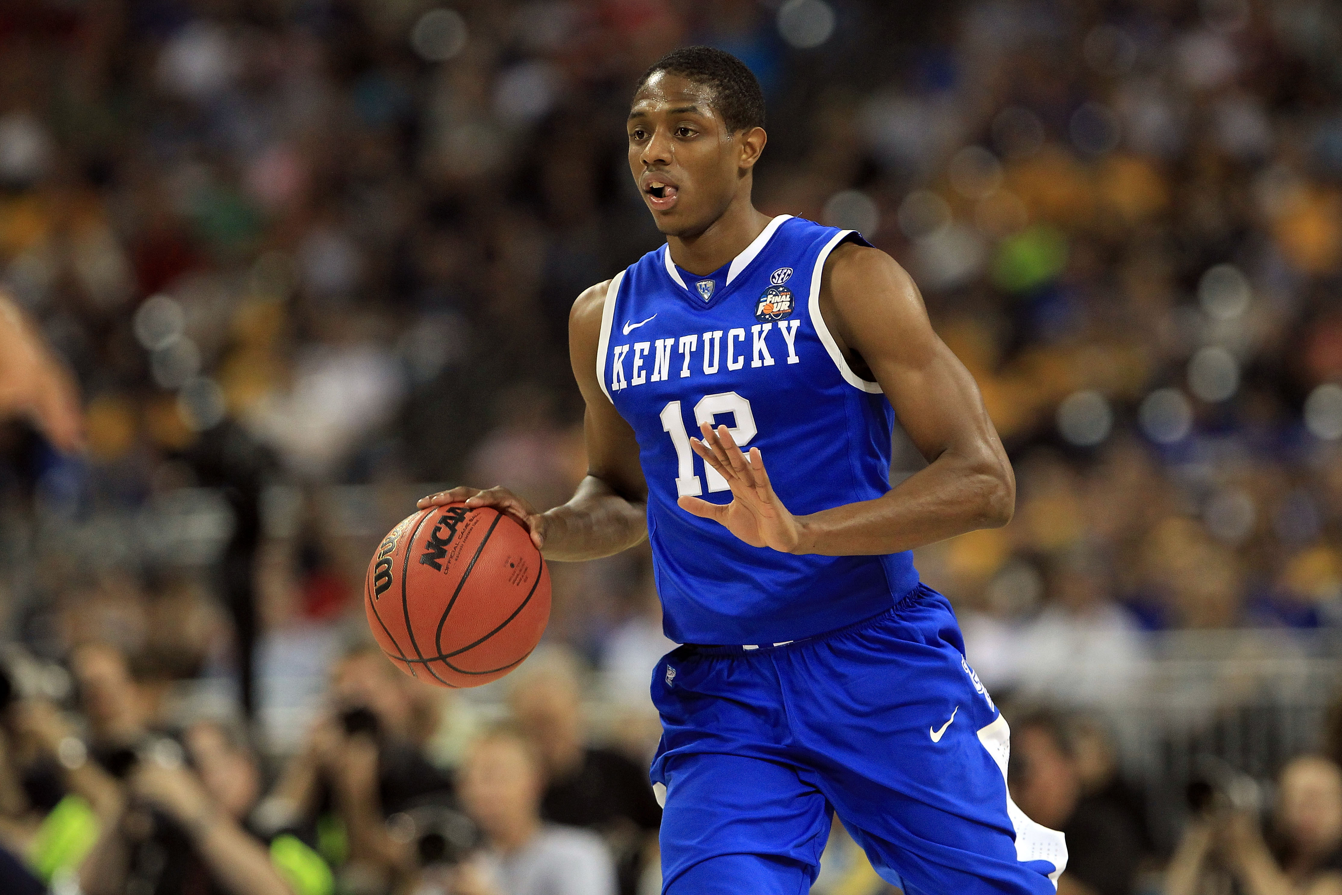 HOUSTON, TX - APRIL 02:  Brandon Knight #12 of the Kentucky Wildcats moves the ball while taking on the Connecticut Huskies during the National Semifinal game of the 2011 NCAA Division I Men's Basketball Championship at Reliant Stadium on April 2, 2011 in