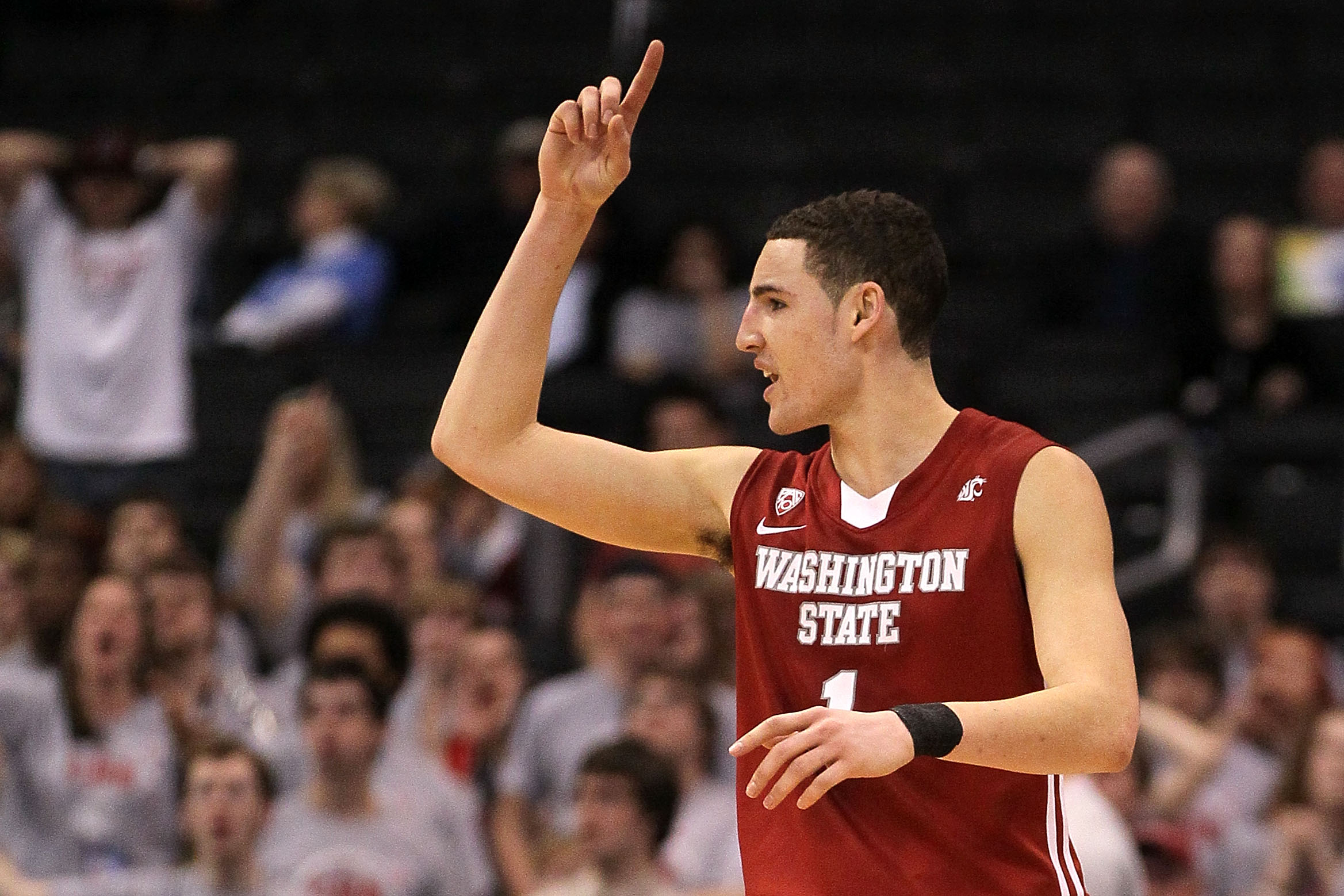 LOS ANGELES, CA - MARCH 10:  Klay Thompson #1 of the Washington State Cougars reacts after making a shot in the second half while taking on the Washington Huskies in the quarterfinals of the 2011 Pacific Life Pac-10 Men's Basketball Tournament at Staples 