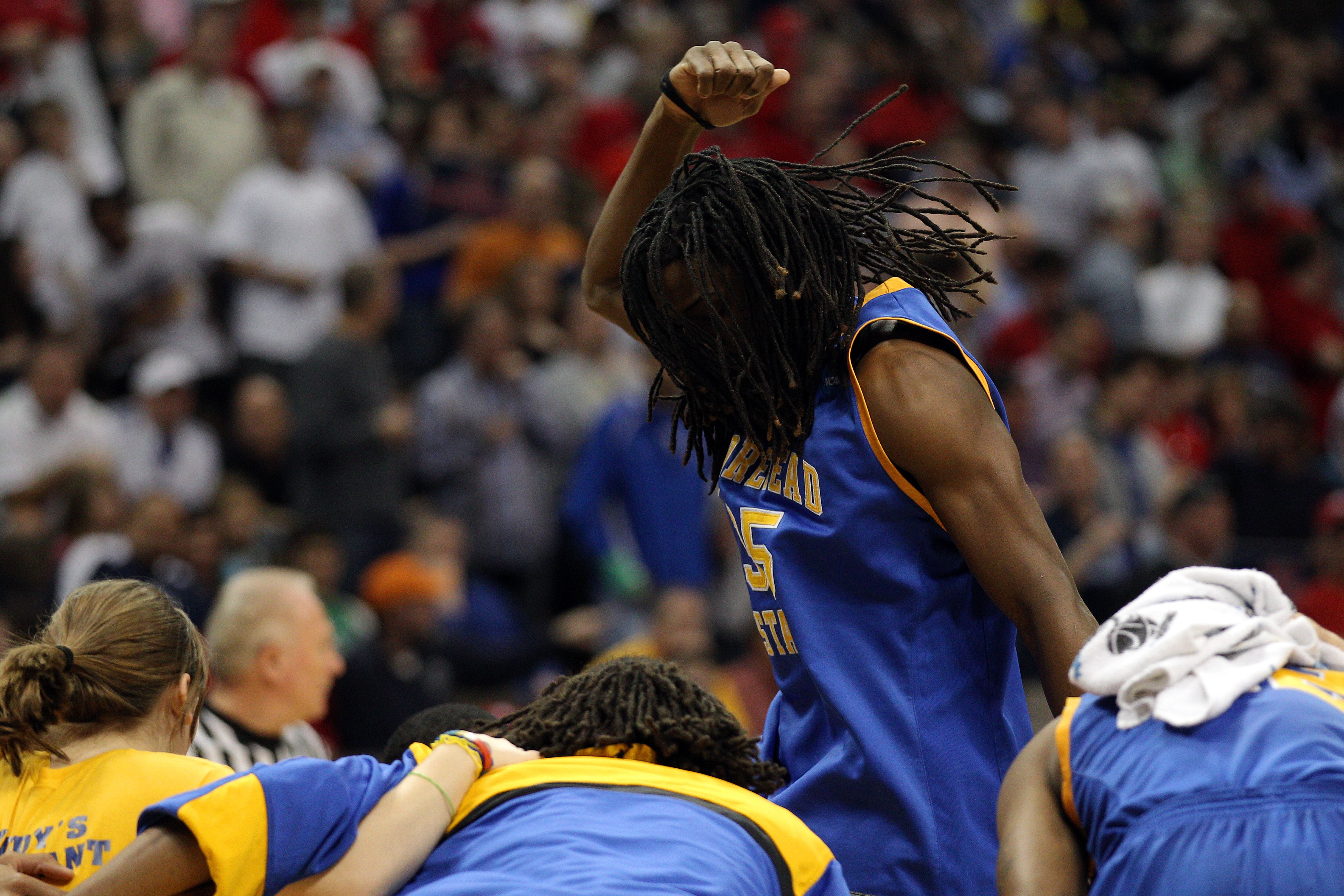 DENVER, CO - MARCH 19:  Kenneth Faried #35 of the Morehead State Eagles cheers his team on before playing against the Richmond Spiders during the third round of the 2011 NCAA men's basketball tournament at Pepsi Center on March 19, 2011 in Denver, Colorad