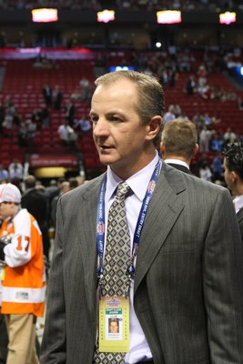 MONTREAL - JUNE 26:  VP of Hockey Operations Al MacInnis of the St. Louis Blues looks on during the first round of the 2009 NHL Entry Draft at the Bell Centre on June 26, 2009 in Montreal, Quebec, Canada. (Photo by Bruce Bennett/Getty Images)