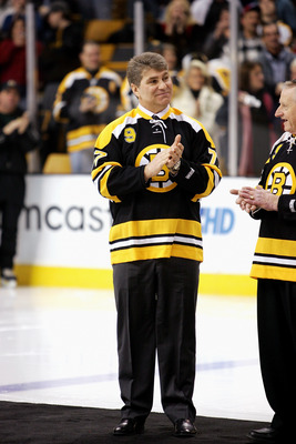 BOSTON - FEBRUARY 13:  Former Boston Bruins player Ray Bourque claps his hands during the ceremony honoring John Bucyk for his 50 years with the Bruins organization before the game against the Edmonton Oilers on February 13, 2007 at TD Banknorth Garden in