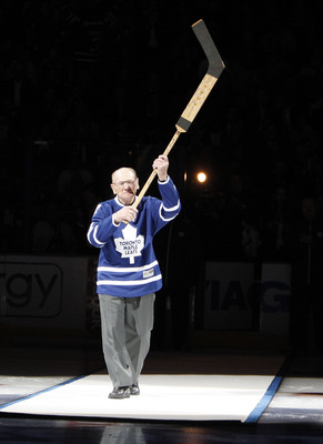 TORONTO, CANADA - OCTOBER 07: Leaf Hall of Famer Johnny Bower take part   in the pre-game ceremony before the Toronto Maple Leafs take on the Montreal Canadiens during a regular season NHL game at the Air Canada Centre October 7, 2010 in Toronto, Ontario,