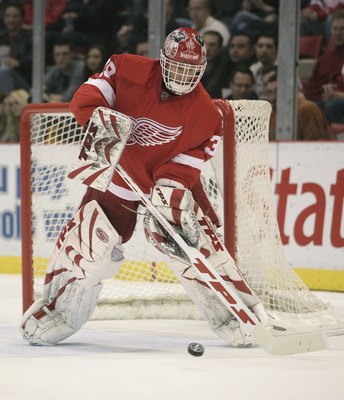 DETROIT - JANUARY 17:  Dominic Hasek #39 of the Detroit Red Wings comes out to corral a shot cleared in a game against the Vancouver Canucks on January 17, 2008 at the Joe Louis Arena in Detroit, Michigan. The Wings defeated the Canucks 3-2 in a shootout.