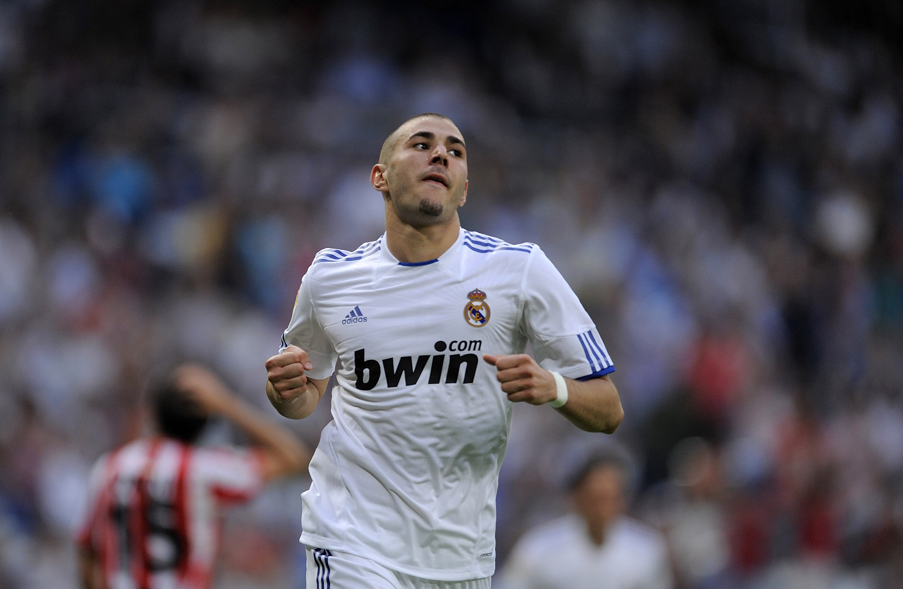 MADRID, SPAIN - MAY 21:  Karim Benzema of Real Madrid celebrates after scoring Real's third goal during the La Liga match between Real Madrid and UD Almeria at Estadio Santiago Bernabeu on May 21, 2011 in Madrid, Spain.  (Photo by Denis Doyle/Getty Images