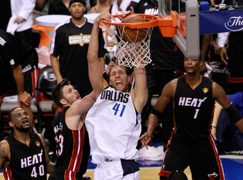 DALLAS, TX - JUNE 09:  Dirk Nowitzki #41 of the Dallas Mavericks dunks against Mike Miller #13 and LeBron James #6 of the Miami Heat late in the fourth quarter in Game Five of the 2011 NBA Finals at American Airlines Center on June 9, 2011 in Dallas, Texa