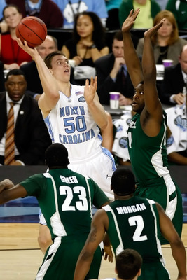North Carolina's Tyler Zeller (44) gets a dunk against Washington during  the third round of the men's NCAA basketball tournament at Time Warner  Cable Arena in Charlotte, North Carolina, Sunday, March 20