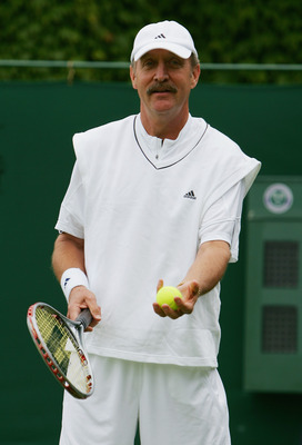 LONDON - JULY 05:  Stan Smith of USA looks on during the Senior Gentleman's Invitational Doubles match against Jeremy Bates of Great Britain and Anders Jarryd of Sweden during day ten of the Wimbledon Lawn Tennis Championships at the All England Lawn Tenn
