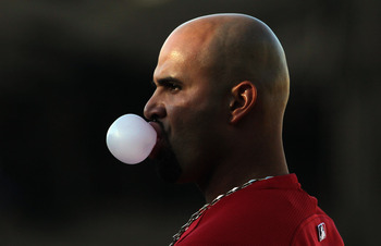 LOS ANGELES, CA - APRIL 16:  Albert Pujols #5 of the St Louis Cardinals blows a bubble prior to the start of the game against the Los Angeles Dodgers at Dodger Stadium on April 16, 2011 in Los Angeles, California.  (Photo by Jeff Gross/Getty Images)