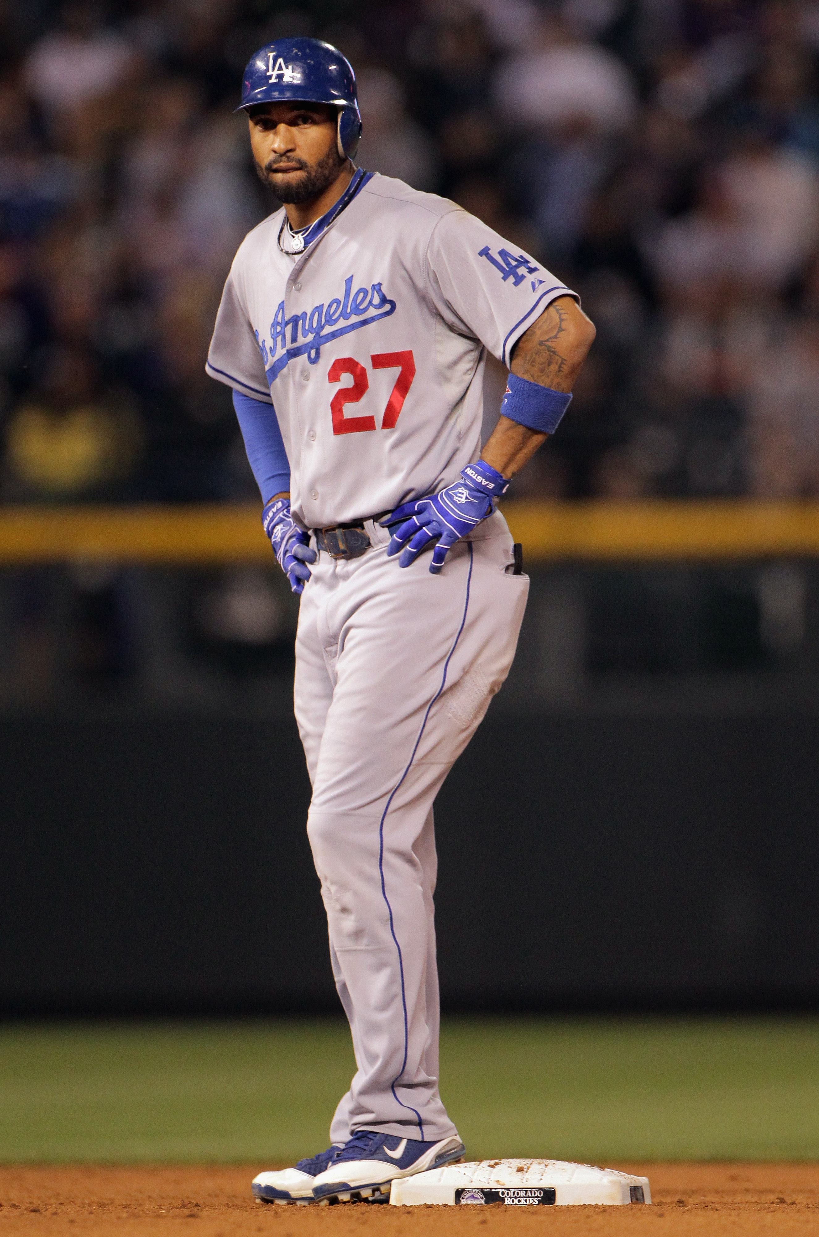 DENVER, CO - JUNE 09:  Matt Kemp #27 of the Los Angeles Dodgers looks on from second base after he doubled against the Colorado Rockies in the seventh inning at Coors Field on June 9, 2011 in Denver, Colorado.  (Photo by Doug Pensinger/Getty Images)