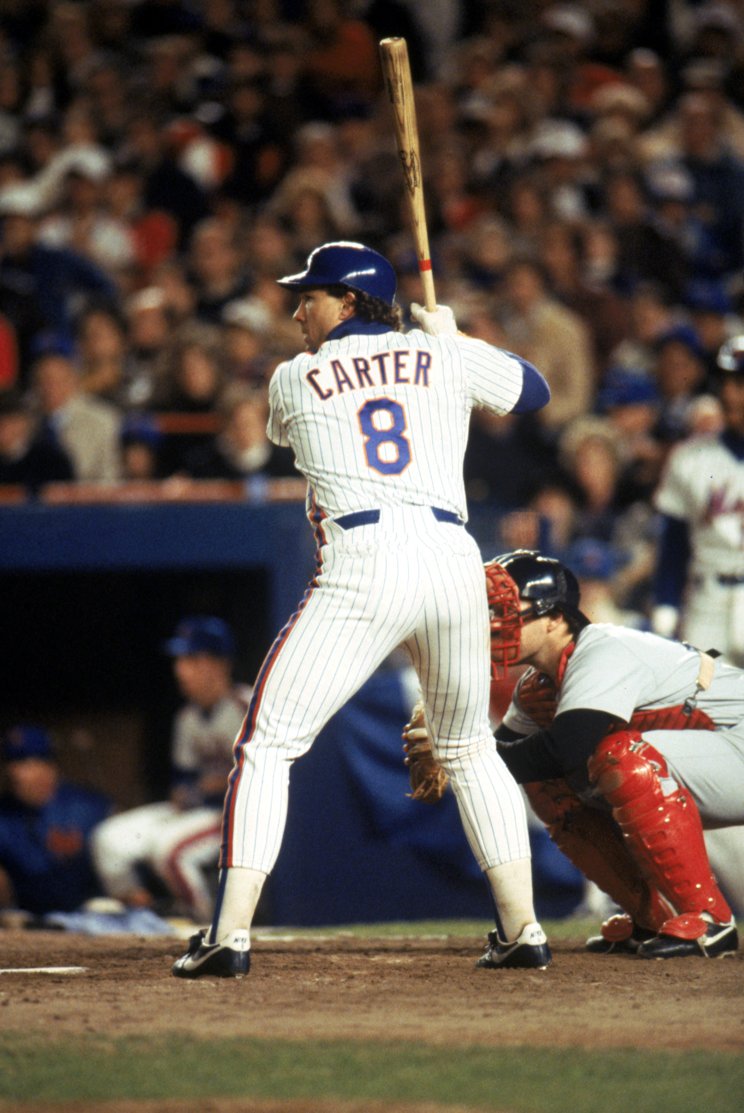 NEW YORK - 1986:  Gary Carter #8 of the New York Mets readies for the pitch during the 1986 World Series game against the Boston Red Sox at Shea Stadium in New York City, New York. The Mets won 4-3. (Photo by Getty Images)