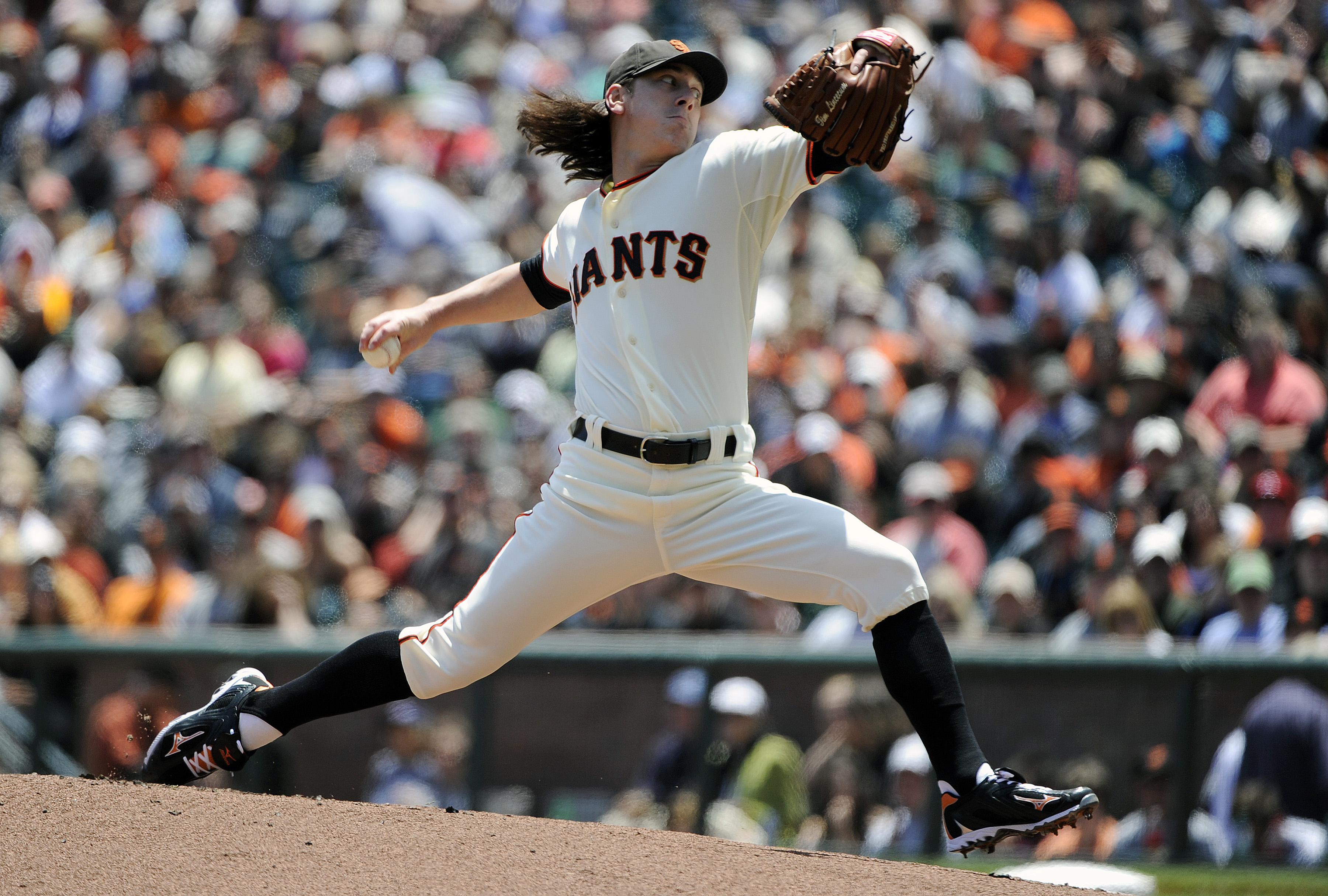 SAN FRANCISCO, CA - JUNE 11: Tim Lincecum #55 of the San Francisco Giants pitches against the Cincinnati Reds in the first inning during a MLB baseball game June 11, 2011 at AT&T Park in San Francisco, California. (Photo by Thearon W. Henderson/Getty Imag