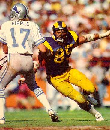 Los Angeles Rams - Rams alumni Jack Youngblood with current player