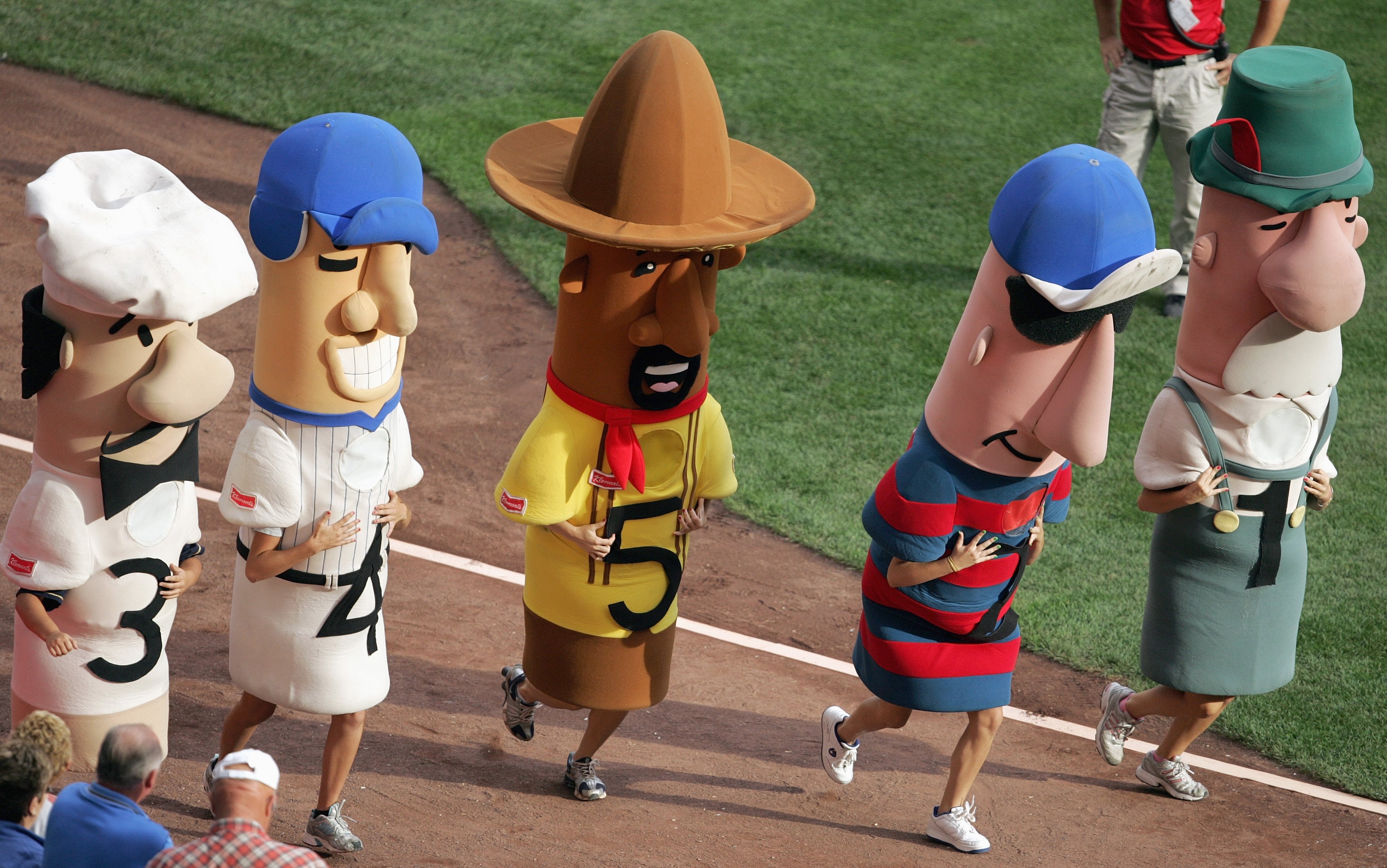 MILWAUKEE - SEPTEMBER 29: Italian Sausage,Hot Dog,Chorizo,Polish Sausage and Bratwurst get ready for the Sausage Race during the game between the San Diego Padres and the Milwaukee Brewers on September 29, 2007 at Miller Park in Milwaukee, Wisconsin. The