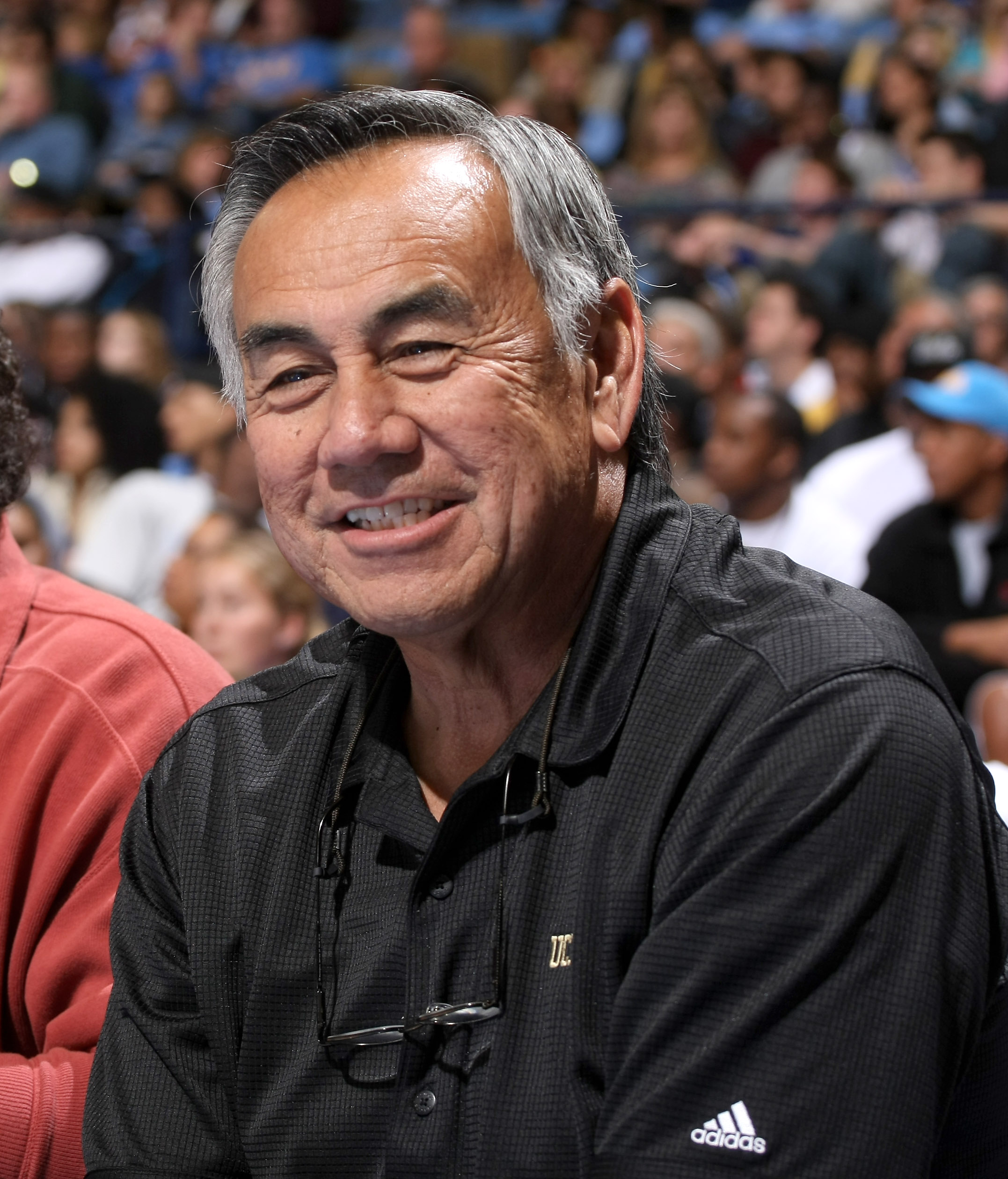 WESTWOOD, CA - JANUARY 16: UCLA football offensive coordinator Norm Chow attends the game between the USC Trojans and the UCLA Bruins on January 16, 2010 at Pauley Pavillion in Westwood, California. USC won 67-46. (Photo by Stephen Dunn/Getty Images)