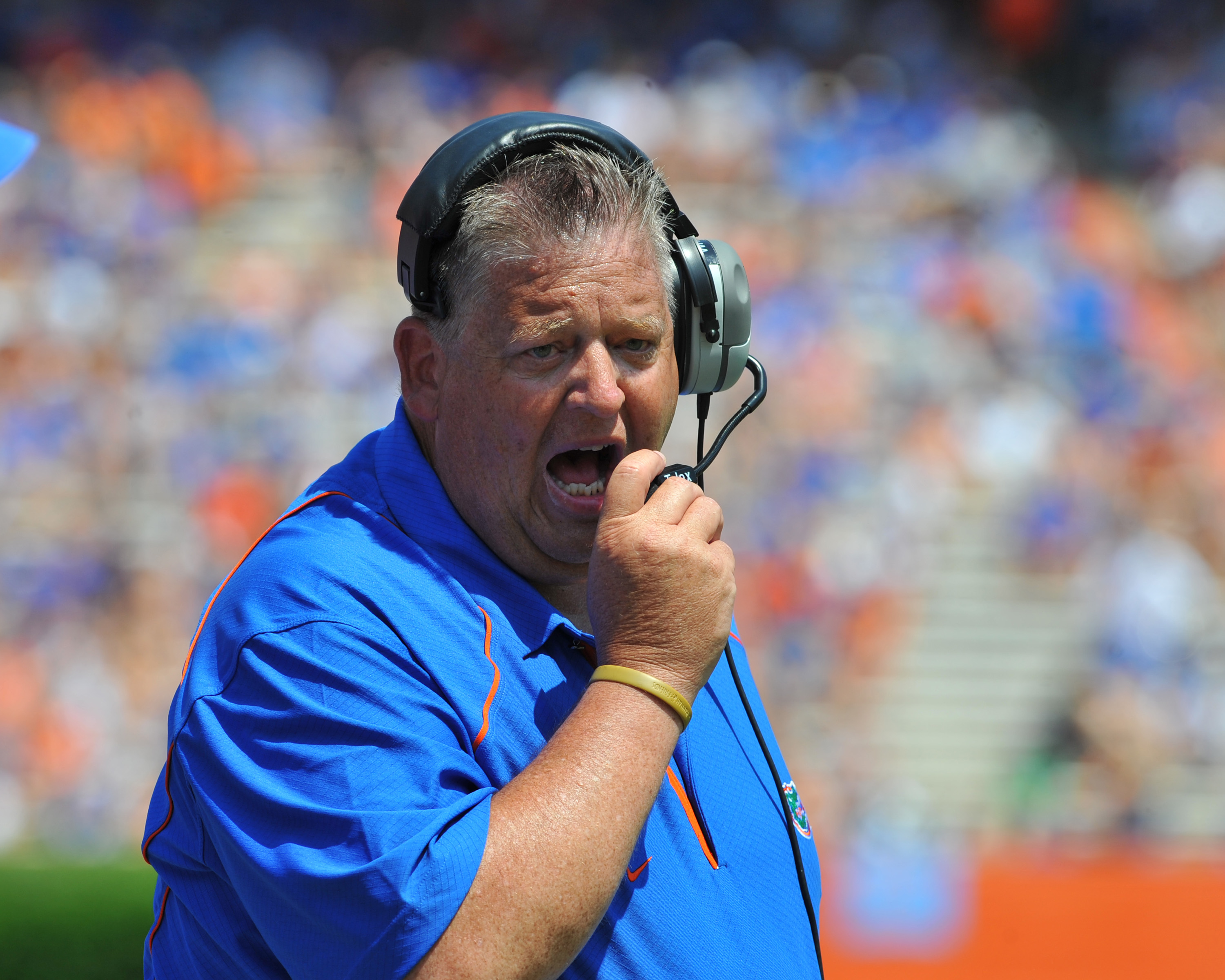 GAINESVILLE, FL - APRIL 9:  Offensive coordinator Charlie Weis of the Florida Gators directs play during the Orange and Blue spring football game April 9, 2011 at Ben Hill Griffin Stadium in Gainesville, Florida.  (Photo by Al Messerschmidt/Getty Images)