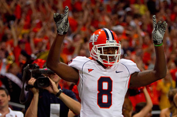 ST. LOUIS - SEPTEMBER 4: A.J. Jenkins #8 of the University of Illinois Fighting Illini celebrates his touchdown against the University of Missouri Tigers during the State Farm Arch Rivalry game on September 4, 2010 at the Edward Jones Dome in St. Louis, M