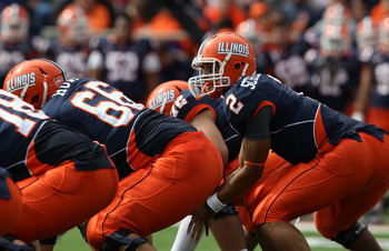 CHAMPAIGN, IL - OCTOBER 02: Nathan Scheelhaase #2 of the Illinois Fighting Illini calls offensive signals as Randall Hunt #66 waits to snap the ball against the Ohio State Buckeyes at Memorial Stadium on October 2, 2010 in Champaign, Illinois. Ohio State