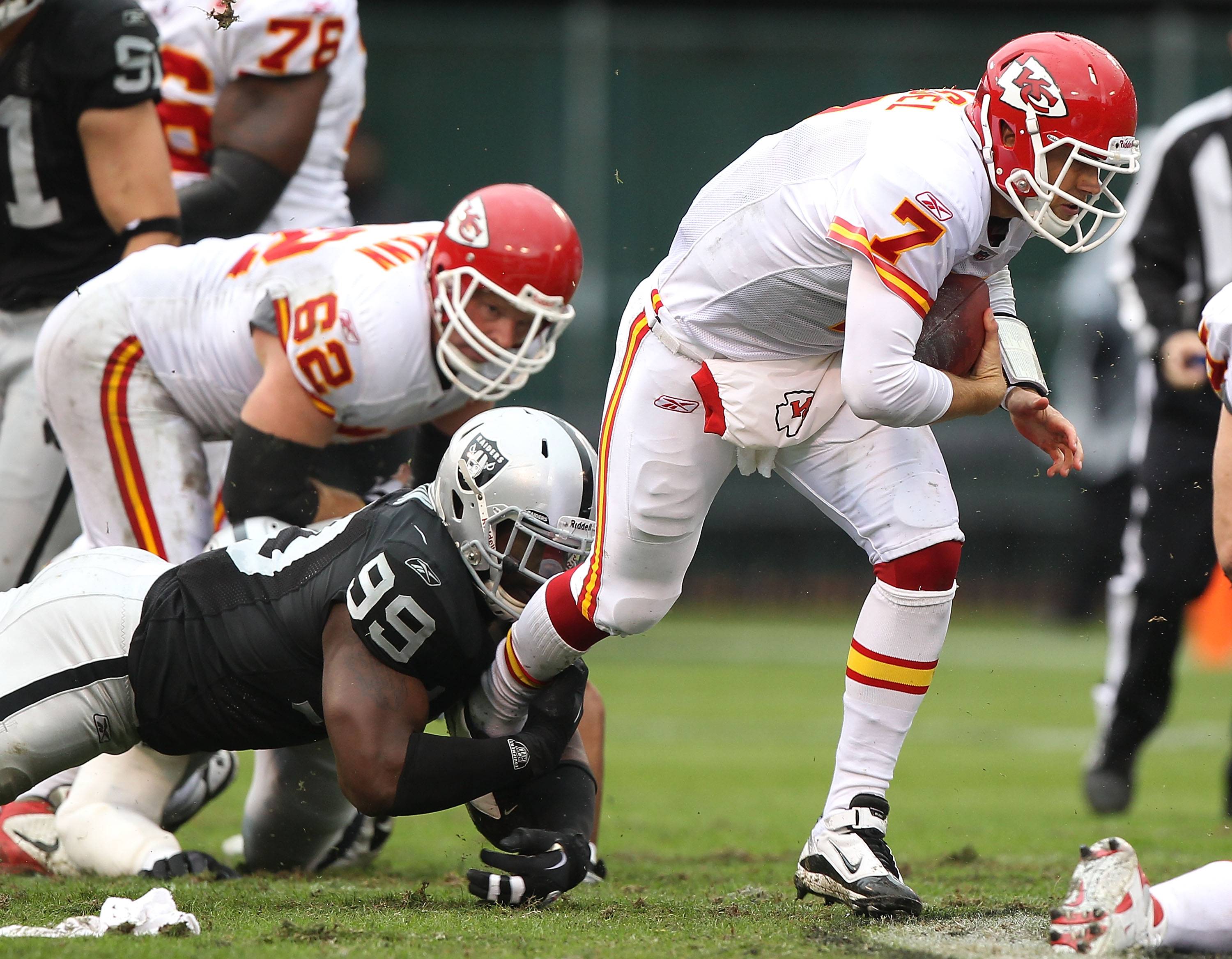 Mike Haynes #22 of the Los Angeles Raiders looks on from the bench against  the Kansas City…